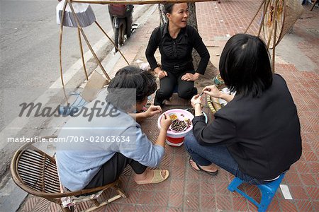 People Eating by Street Vendor, Hanoi, Vietnam