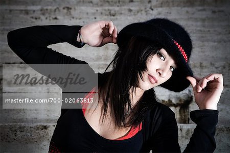 Female Hip Hop Dancer Wearing Hat and Posing