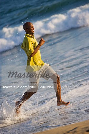 Man Running on the Beach, Huntington Beach, Orange County, California, USA