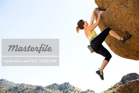 Sporty Woman in Boulder Climbing Hall Stock Photo - Image of