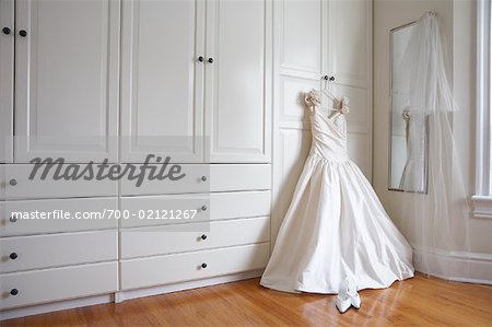 Wedding Dress Hanging on Closet Door