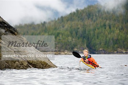 Man Sea Kayaking, Nootka Sound, British Columbia, Canada