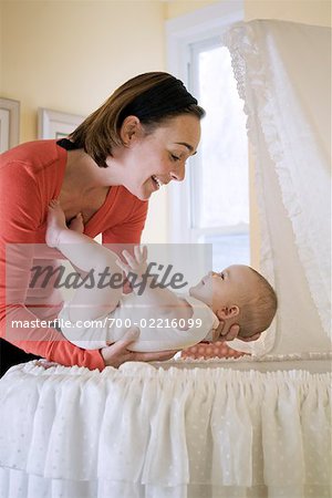 Mother with Baby in Bassinet
