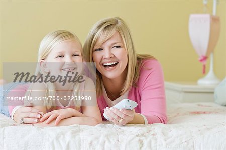 Mother and Daughter Watching TV