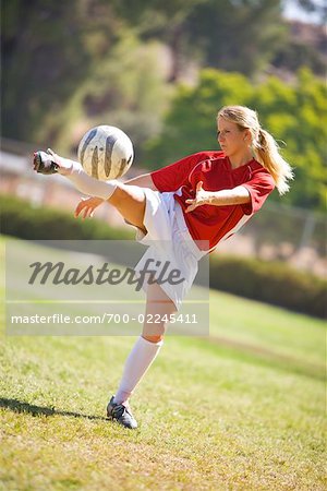 Woman Kicking Soccer Ball, Woodland Hills, California, USA