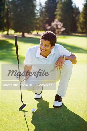 Man on Golf Course Lining Up Shot Salem, Oregon, USA