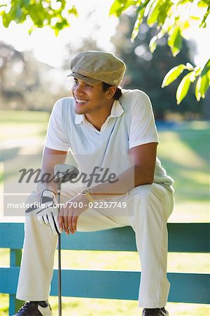 Man Sitting on Bench, Taking a Break From Golfing, Salem, Oregon USA