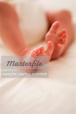 Close-up of Newborn Baby Girl's Feet