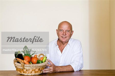 Portrait of Man with Basket of Vegetables