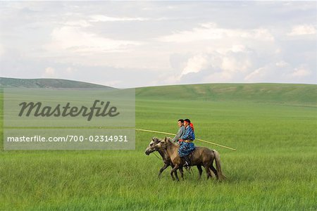 Horsemen in Grasslands, Inner Mongolia, China
