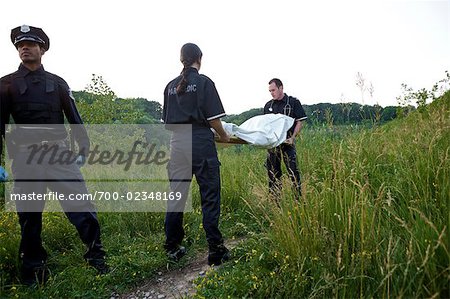 Police Officer and Paramedics with Body Bag, Toronto, Ontario, Canada