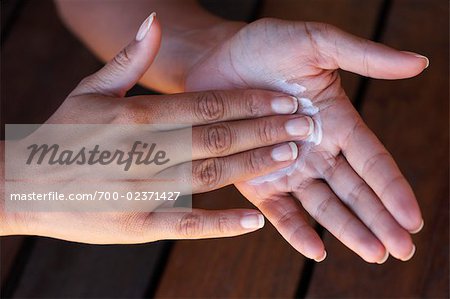 Woman's Hands with Lotion