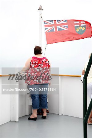 Woman on Boat by Ontario Flag