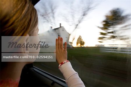 Young Girl Looking Out Car Window Young Girl Looking Out Car Window