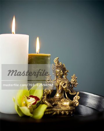 Vasudhara, Buddhist Goddess of Abundance and Fertility, Candles and Orchid