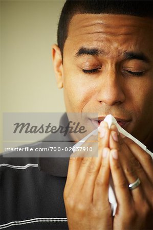 Man Sneezing