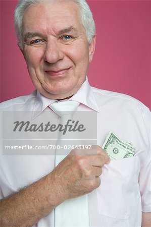 Man Taking Dollar Bill Out of His Pocket