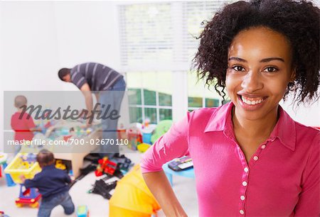 Mother with Family in Play Room