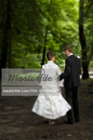 Bride and Groom Walking in Woods, Chamonix, Haute-Savoie, France