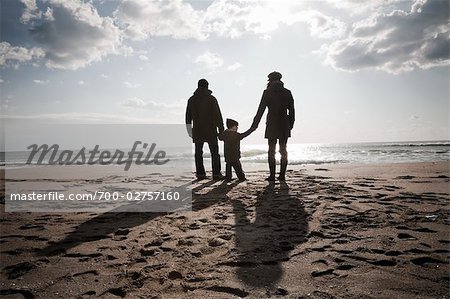 Family on Beach in Winter, Lazio, Rome, Italy