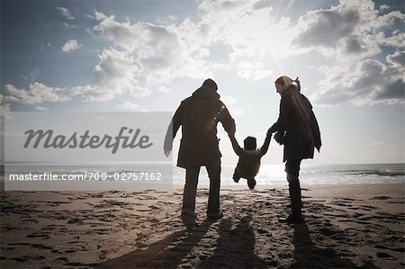 Family on Beach in Winter, Lazio, Rome, Italy