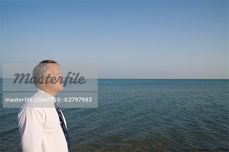 Businessman by the Ocean