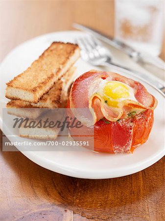 Baked Tomato with Egg and Back Bacon and Toast Soldiers