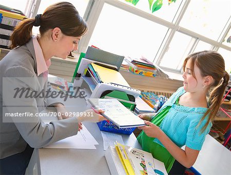 Teacher Giving Assignment to Student