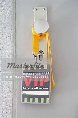 VIP Pass Hanging From Doorknob