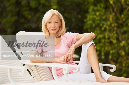 Portrait of Woman Sitting in Lounge Chair