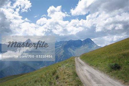 Country Road and Alps, Stroppo, Province on Cuneo, Piemonte, Italy