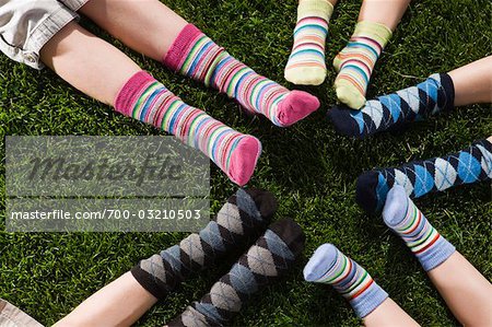 Woman feet in multicolored striped socks stock photo (160474) -  YouWorkForThem