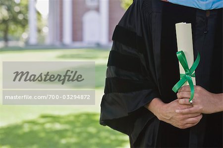 College Graduate Holding Diploma