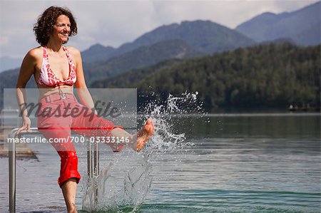 Woman Kicking at Water, Fuschlsee, Salzburg, Austria
