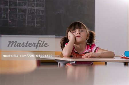 School Girl Sitting At Desk Stock Photo Masterfile Rights