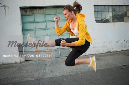Woman Practicing Martial Arts