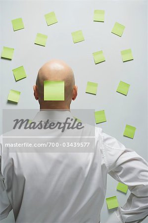 Businessman with Sticky Notes