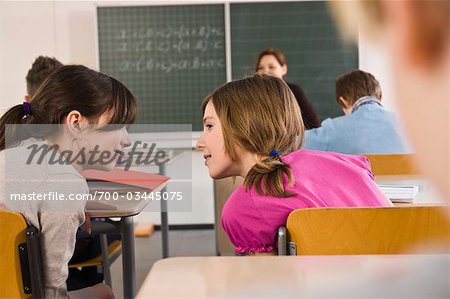 Students Whispering in Class Students Whispering in Class