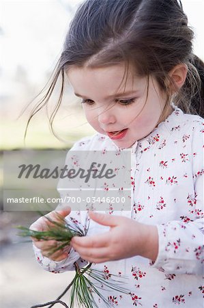 Little Girl Playing Outdoors