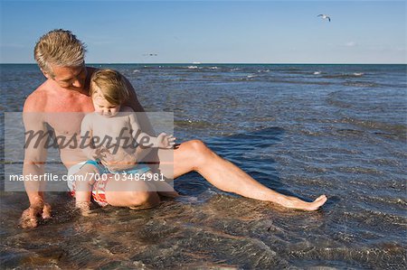 Grandfather and Grandson at Beach