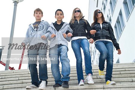 Group of Friends Walking Down Stairs, Outdoors