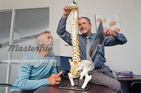 Mature Man Consulting with Doctor