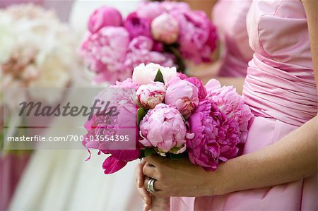 Bridesmaids Holding Flowers at Wedding