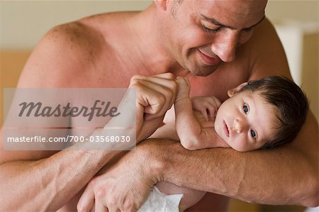 Father Holding Infant Daughter