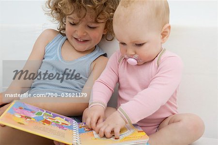 Brother and Sister Reading a Book