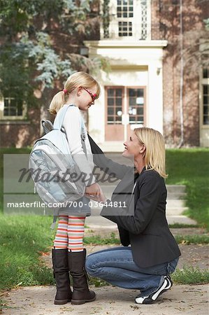 Mother Walking Daughter to School