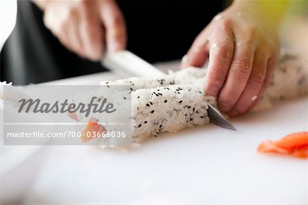 Close-up of Person Making Sushi