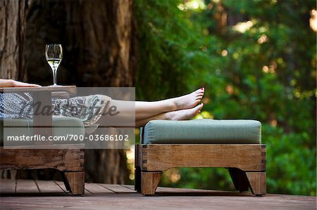 Woman Relaxing on Deck, Santa Cruz County, California, USA