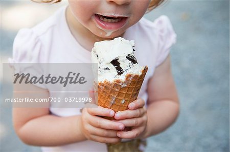 Little Girl Eating Ice Cream