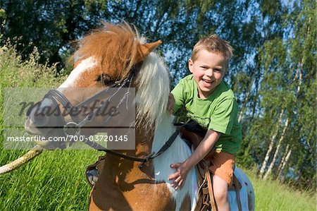 Download Boy Riding Shetland Pony Stock Photo Masterfile Rights Managed Artist Bettina Salomon Code 700 03720145